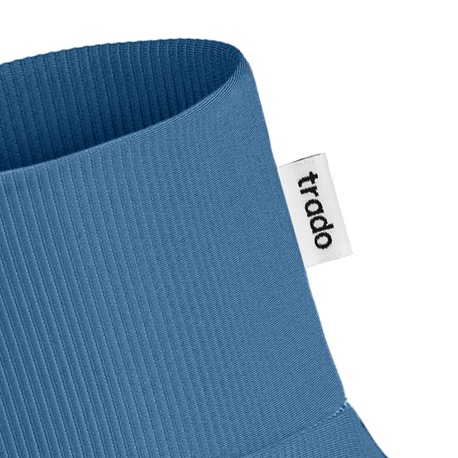 trado label on the trado trail gaiter blue