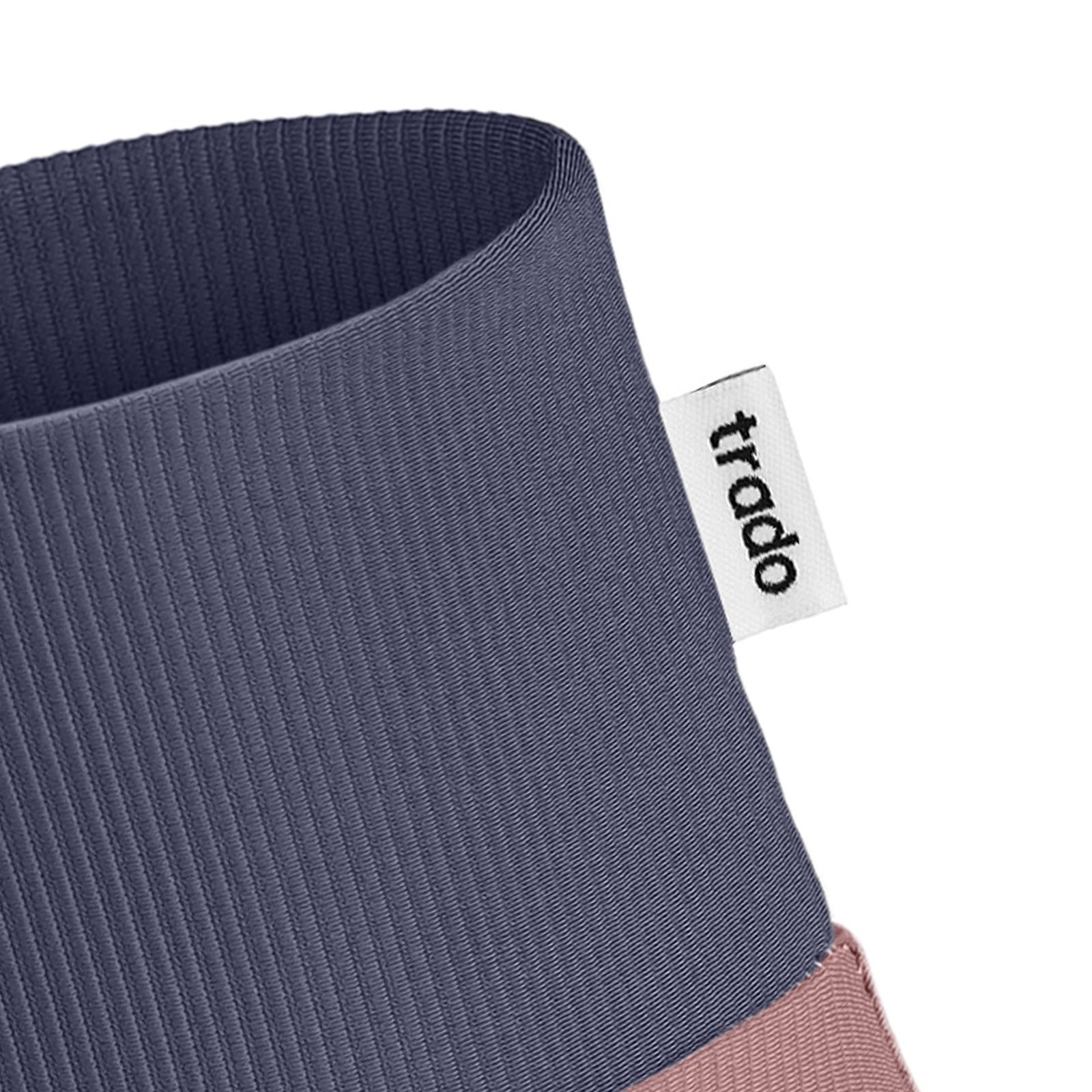 trado label on the trado trail gaiter dark indigo dusty rose