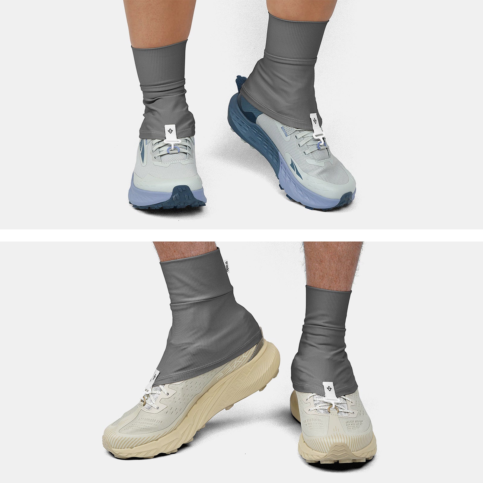 Two pairs of feet wearing trado trail gaiters on a white background  charcoal