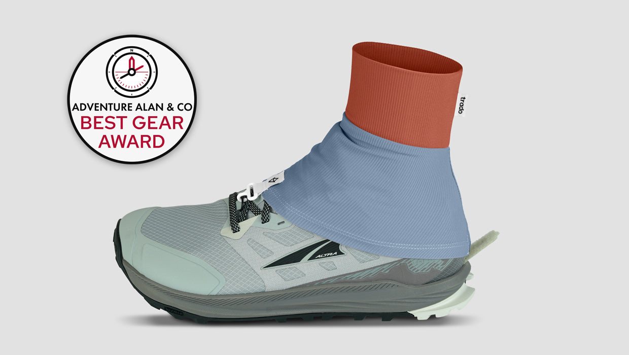 Shoe with blue gaiter and red top, featuring 'Adventure Alan & Co. Best Gear Award' logo.